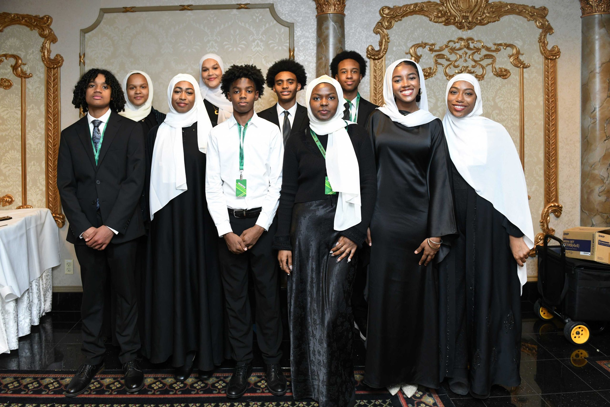 Group of students gathered together smiling for the Pre-Ramadan Fundraiser for Islamic-Centered School